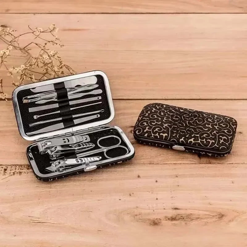“Set of 11 happy face nail tools including file and scissors.”