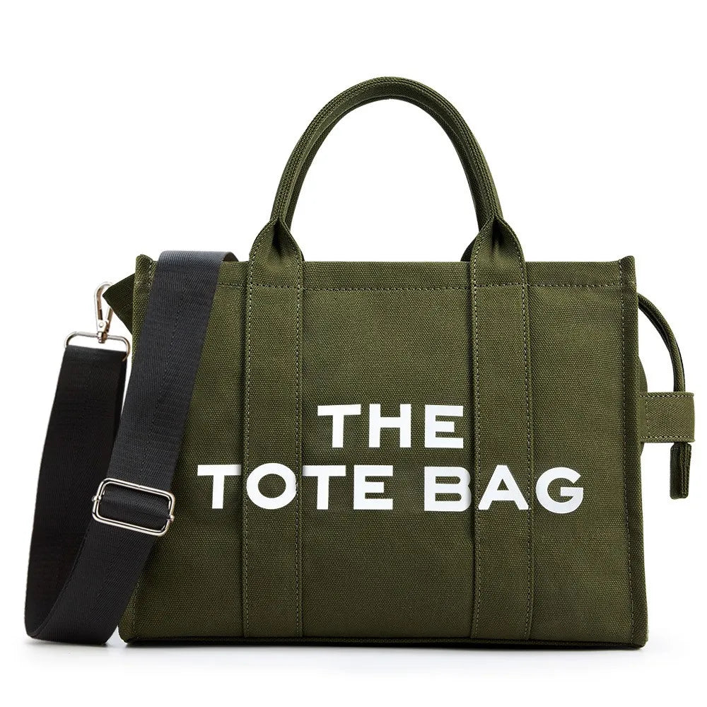 “Designer canvas tote bag, large capacity, adjustable shoulder strap, crossbody style.”