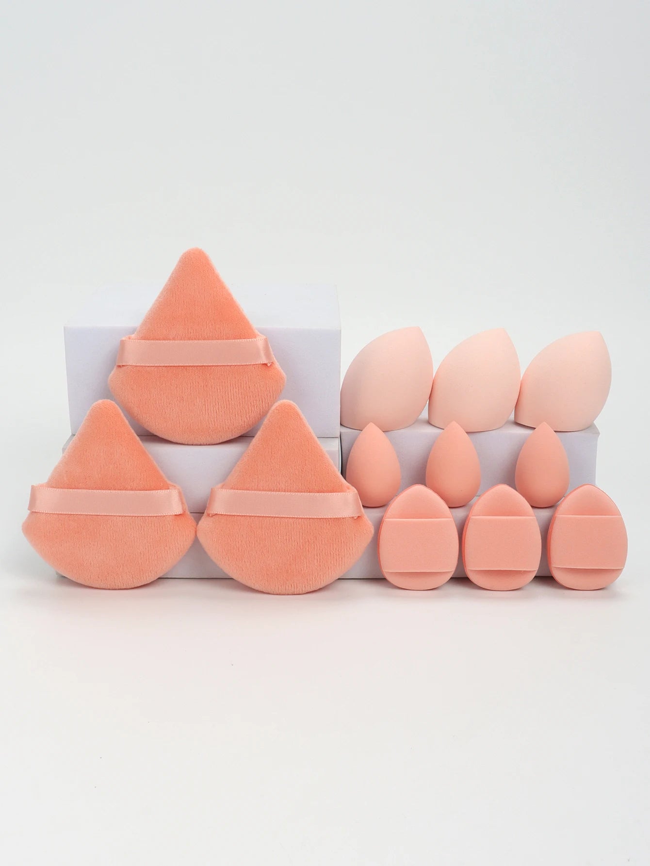 “12-piece makeup sponge set: powder puffs, air cushion puffs, and beauty eggs.”