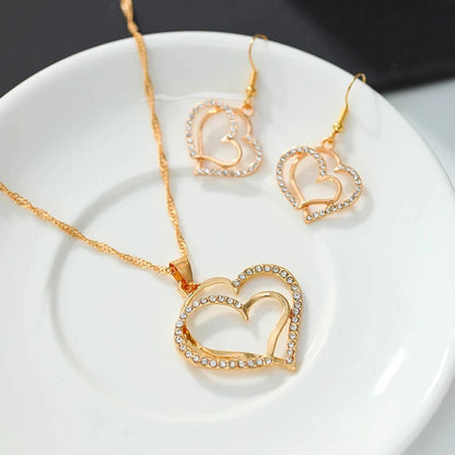 “3-Piece Heart-Shaped Jewelry Set - Earrings, Pendant, Necklace with Rhinestones.”
