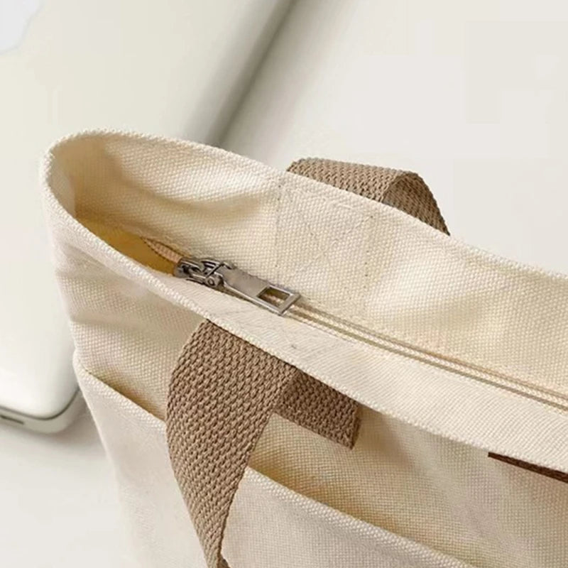 “Women’s solid color canvas tote bag, large capacity, casual, reusable, beach shopping.”