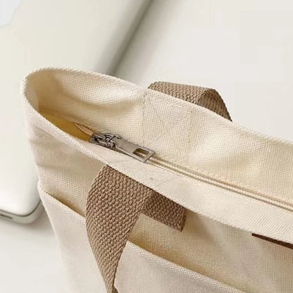 “Women’s solid color canvas tote bag, large capacity, casual, reusable, beach shopping.”