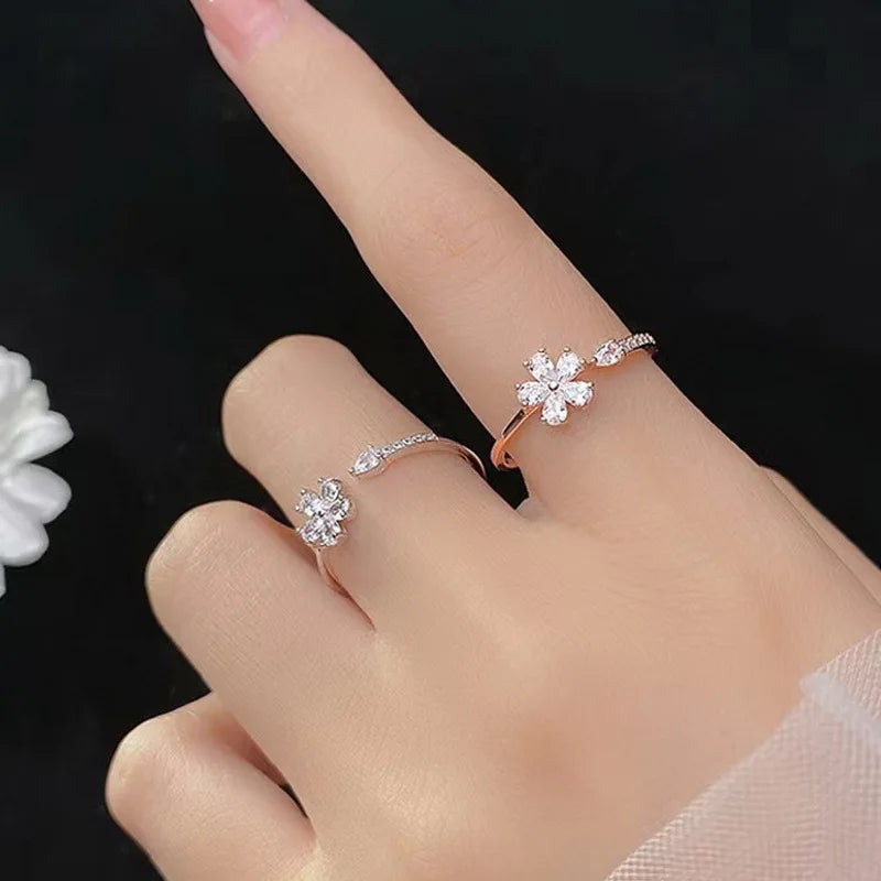 “Luxury Zircon Flower Rings for Women - Rose, Cherry Blossom, Tulip Design, Adjustable.”