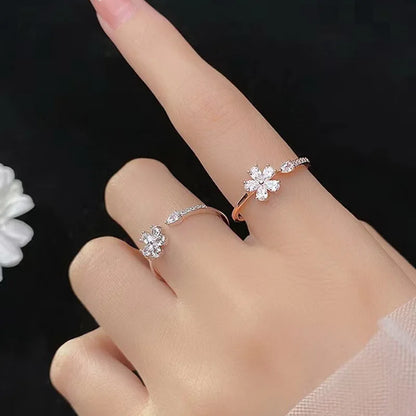 “Luxury Zircon Flower Rings for Women - Rose, Cherry Blossom, Tulip Design, Adjustable.”
