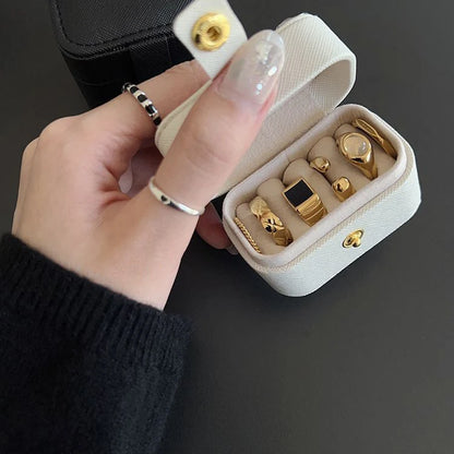 “Mini Portable Jewelry Storage Bag Leather Travel Box for Rings, Necklaces, Earrings.”