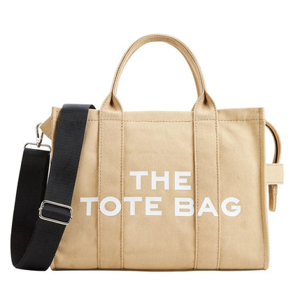 “Designer canvas tote bag, large capacity, adjustable shoulder strap, crossbody style.”