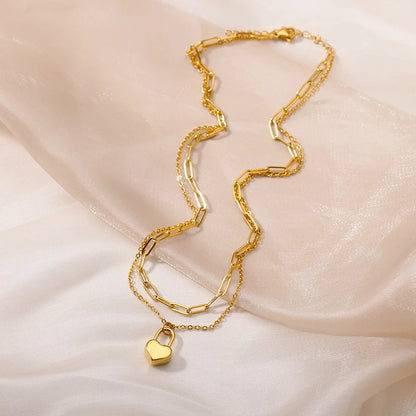 “316L Stainless Steel Heart Necklace - Multilayer Gold Goth Jewelry.”