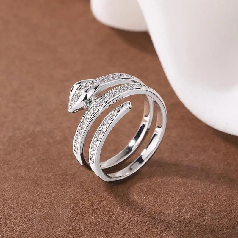 “Gold snake rings, adjustable, punk hip-hop style, stainless steel with zircon details.”