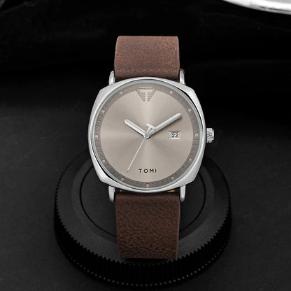“Minimalist men’s sports watch with calendar, leather strap, casual quartz movement.”