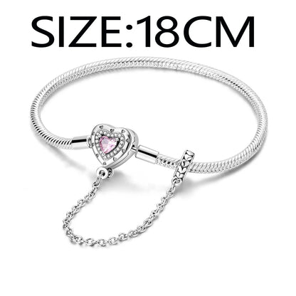 “Silver plated charm bracelet with safety chain, snake chain fits beads, perfect gift.”