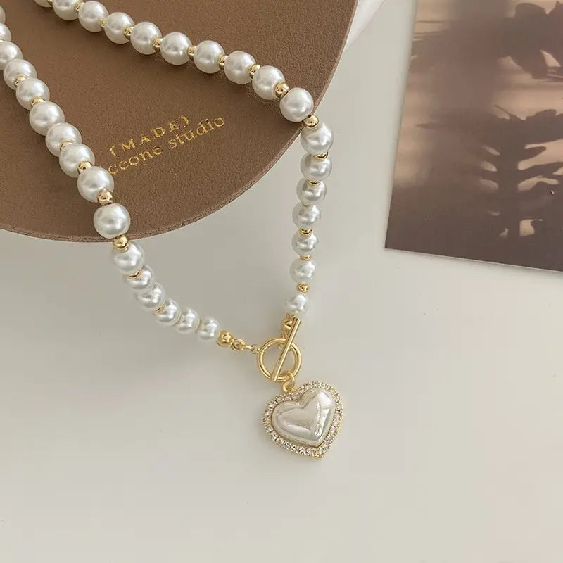 “Elegant Pearl Necklace for Women - Heart Pendant, Luxury Imitation Pearls, Korean Jewelry.”