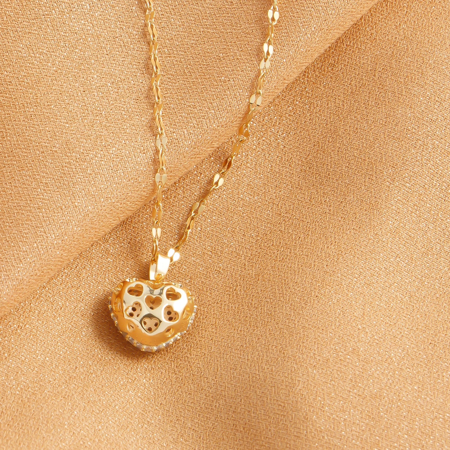 “Cubic Zirconia Heart Pendant Necklace - Gold-Plated Stainless Steel for Women.”