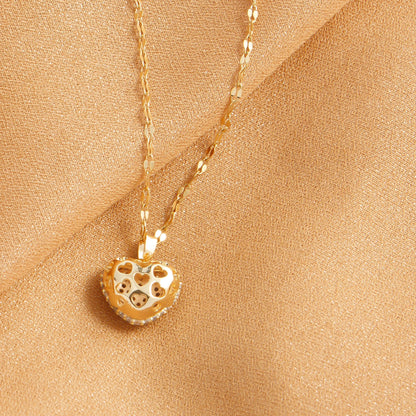 “Cubic Zirconia Heart Pendant Necklace - Gold-Plated Stainless Steel for Women.”