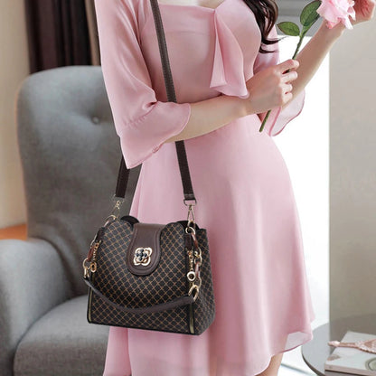 “Luxury bucket handbag for women, check print, spacious design, crossbody style.”