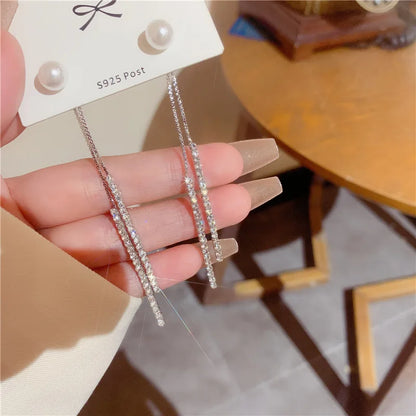 “Korean Tassel Pearl Drop Earrings - Luxury Gold Wedding Jewelry.”