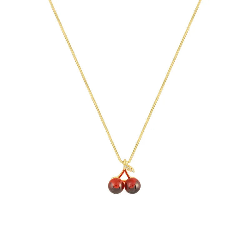“Stainless Steel Wine Red Cherry Pendant Necklace - Gold Color, Fashion Jewelry for Women.”