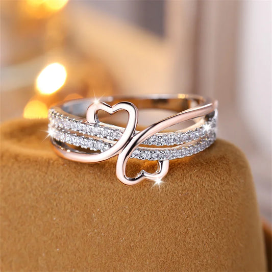 “Two-tone double heart ring, rose gold and silver, white zircon, perfect bridal jewelry.”
