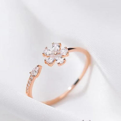 “Luxury Zircon Flower Rings for Women - Rose, Cherry Blossom, Tulip Design, Adjustable.”
