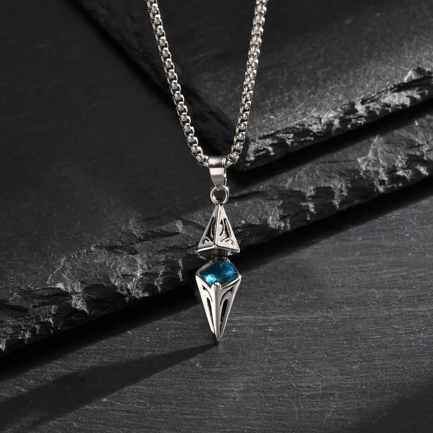 “Stylish Blue Stone Necklace for Men & Women - Stainless Steel Geometric Pendant.”