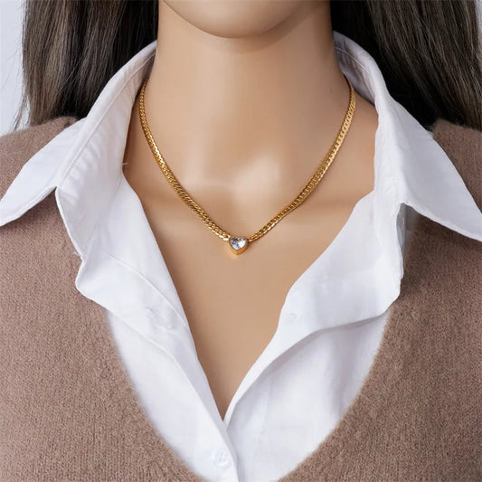 “Stainless Steel Heart-Shaped Green & White Crystal Pendant Necklace & Bracelet Set.”