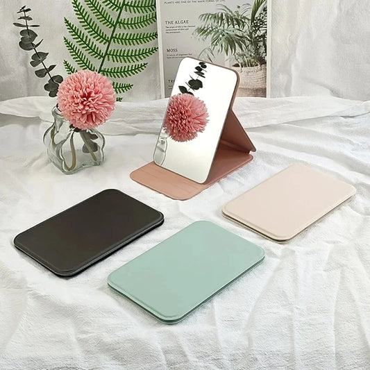 “Woman MINI Folding Portable Pocket Makeup Mirror Creative Solid Color Handle”