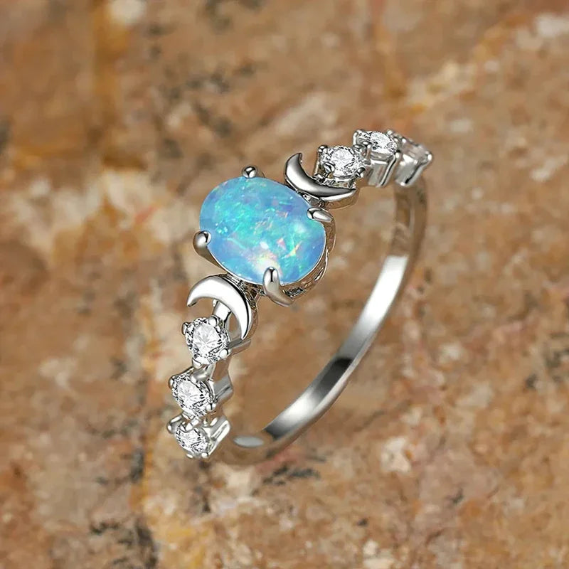 “Blue/white imitation opal moon rings, elegant wedding and anniversary jewelry gifts.”