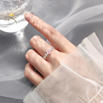 “Luxury Zircon Flower Rings for Women - Rose, Cherry Blossom, Tulip Design, Adjustable.”