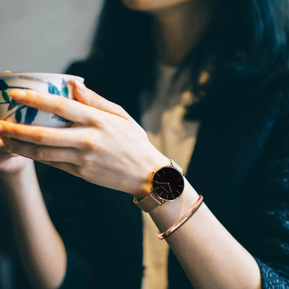 “Rose gold women’s bracelet watch, stainless steel mesh, simple, Japanese quartz.”