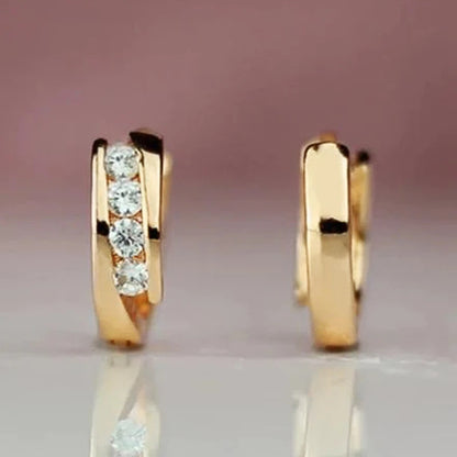 “Gold hoop earrings for women, daily wear, elegant, versatile statement jewelry.”