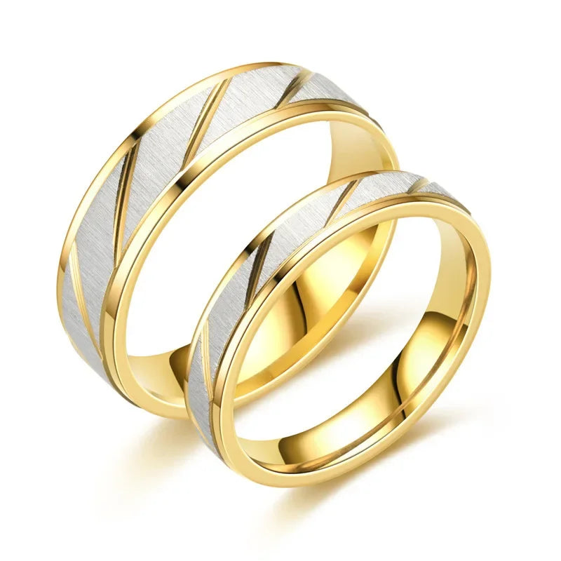 “Gold wave-pattern couple rings, stainless steel, perfect for weddings or promises.”