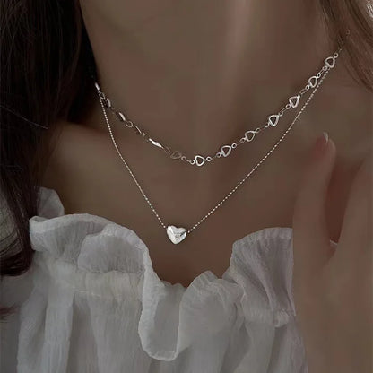 “Tassel Necklace for Women - Gold/Silver Triangle Pendant Long Necklace.”