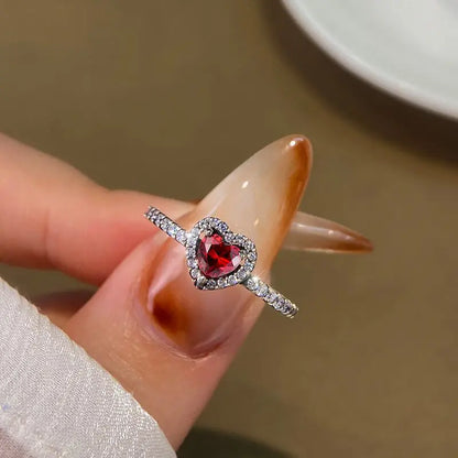 “Shiny Zircon Heart Ring - 925 Sterling Silver Luxury Jewelry for Engagements & Weddings.”