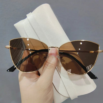“Retro cat-eye sunglasses, small metal frame, European style, UV400 protection.”