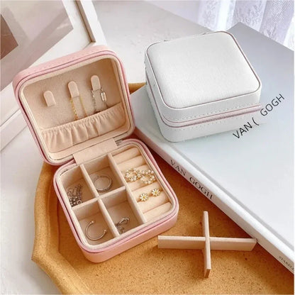 “Portable mini jewelry storage box, PU leather, for earrings, necklaces, rings.”