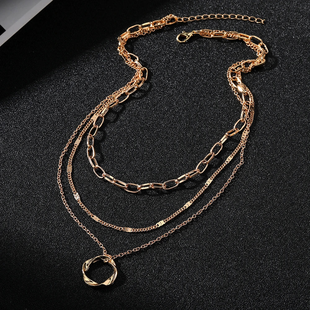 “IPARAM Gold Multi-Layered Chain Necklace – Vintage Circle Pendant, Fashion Jewelry for Women & Girls”