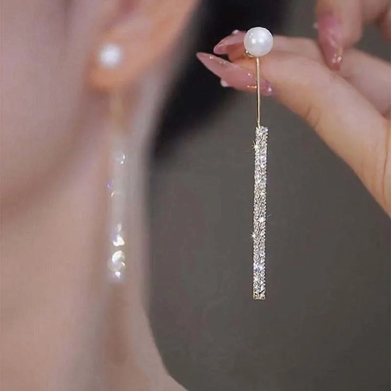 “Korean Tassel Pearl Drop Earrings - Luxury Gold Wedding Jewelry.”
