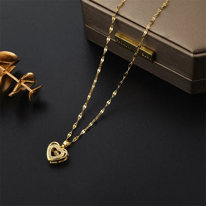 “Cute Beating Heart Crystal Pendant Necklace - Korean Fashion Stainless Steel Clavicle Chain.”