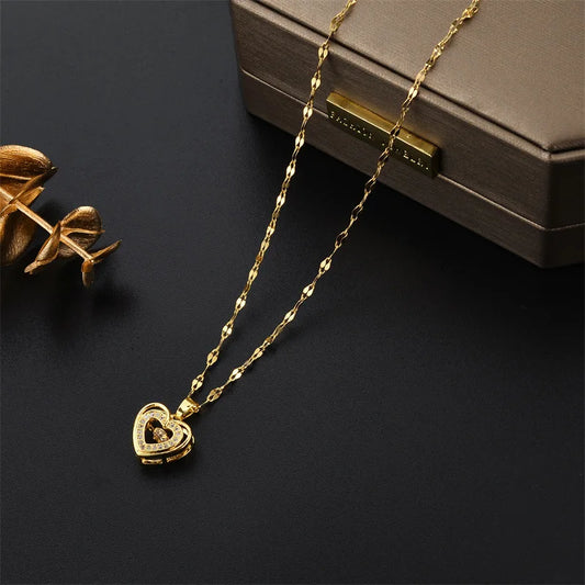 “Cute Beating Heart Crystal Pendant Necklace - Korean Fashion Stainless Steel Clavicle Chain.”