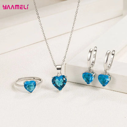 “Romantic 925 Sterling Silver Jewelry Set - Heart-Shaped Zircon Earrings, Necklace, and Ring.”