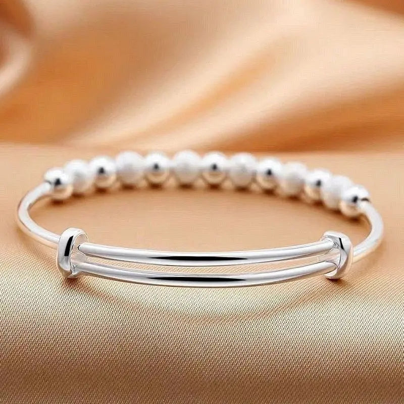 “925 Silver-Color Luxury Charms Beads Bracelet - Adjustable Fashion Jewelry for Women.”