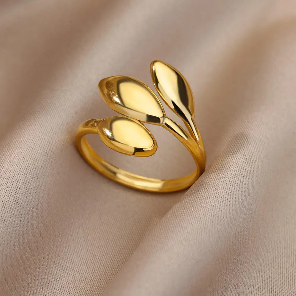 “Trendy Gold Stainless Steel Rings for Women - Perfect Wedding & Couple Jewelry.”