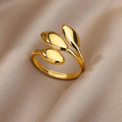 “Trendy Gold Stainless Steel Rings for Women - Perfect Wedding & Couple Jewelry.”