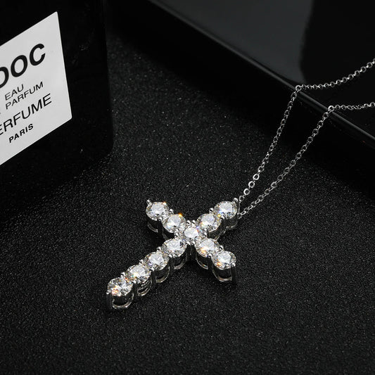 “Moissanite cross pendant necklace, 925 sterling silver, 18k white gold plated.”