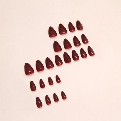 “24pcs mid-length almond-shaped wine red press-on nails.”