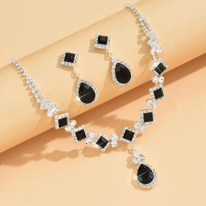 “3-piece claw chain geometric droplet earrings and necklace set, elegant wedding party gift.”
