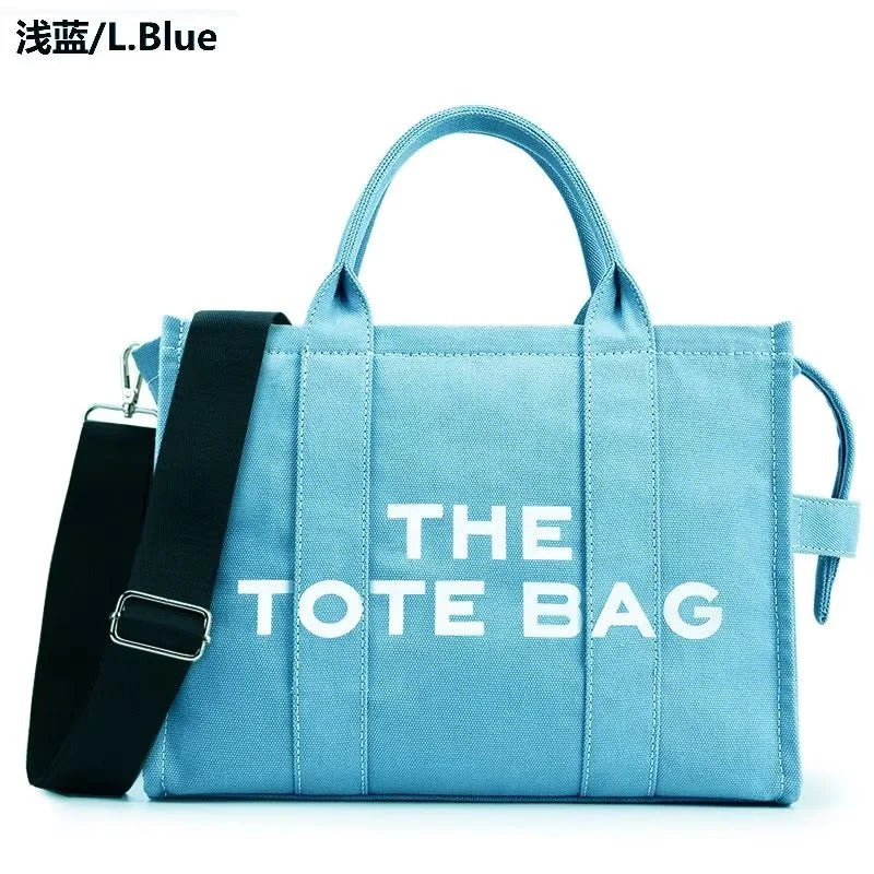 “Designer canvas tote bag, large capacity, adjustable shoulder strap, crossbody style.”