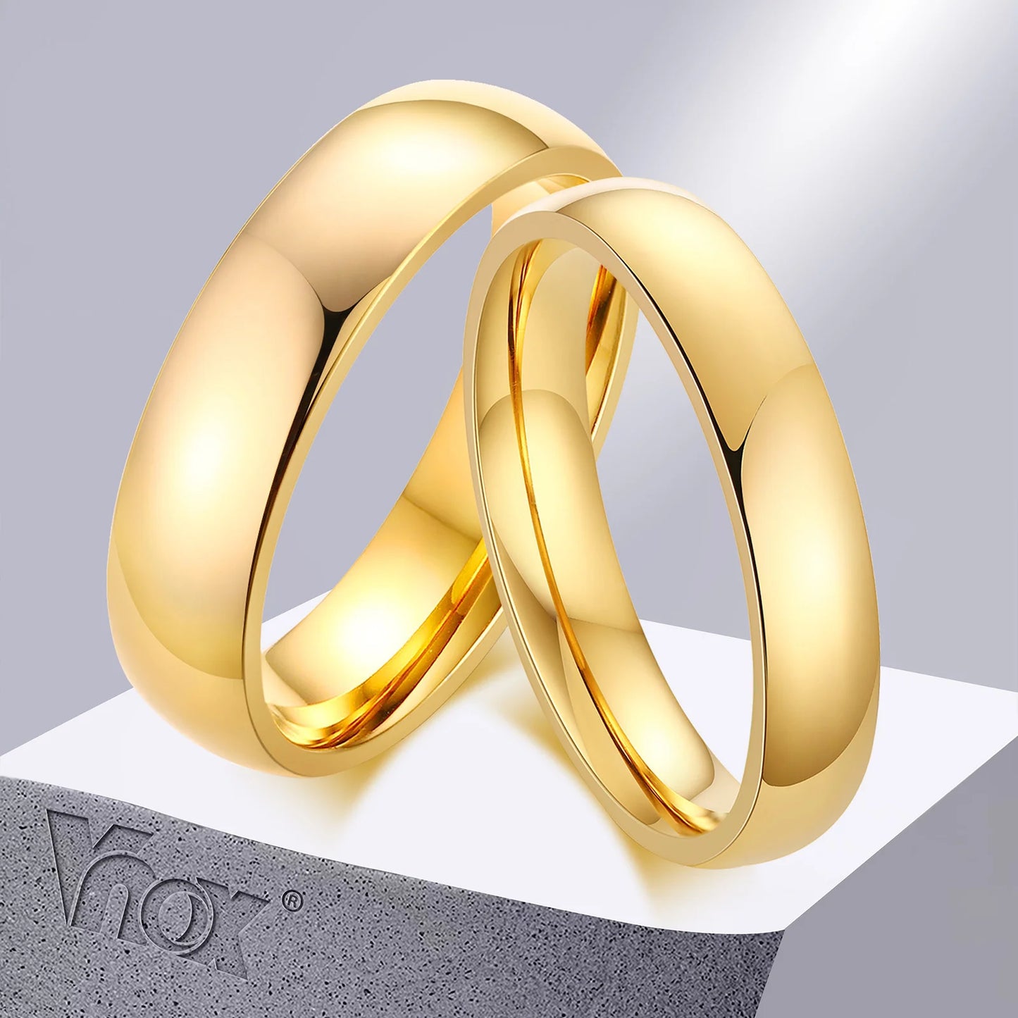 “Anti-scratch tungsten wedding rings, simple classic bands, durable couples jewelry, timeless design.”