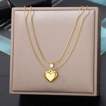 “316L Stainless Steel Heart Necklace - Multilayer Gold Goth Jewelry.”