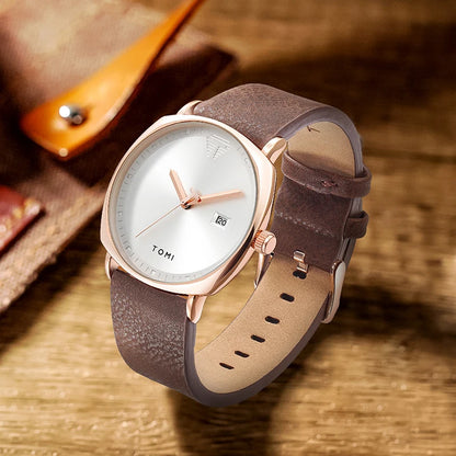 “Minimalist men’s sports watch with calendar, leather strap, casual quartz movement.”