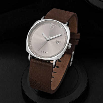 “Minimalist men’s sports watch with calendar, leather strap, casual quartz movement.”